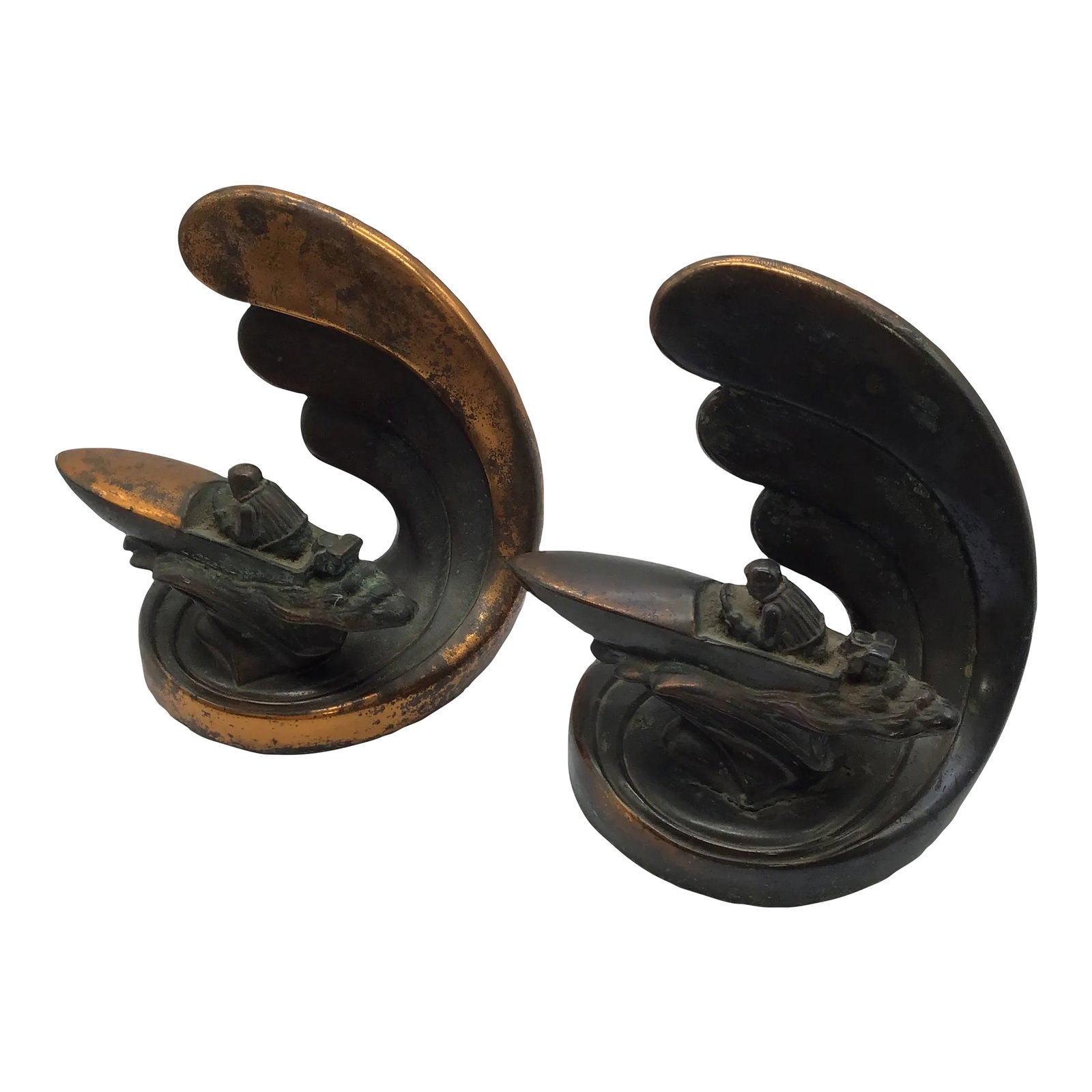 Art Deco Vintage 1930s Art Deco Bookends by Dodge Inc Speed Boat With Wave Bronze Metal - a Pair: This lovely pair of Art Deco bookends depicts a curled wave in the background with a man in aracing boat at full throttle Very RARE to find Made by Dodge Trophy Inc from Los Angeles CA in the 1930's O