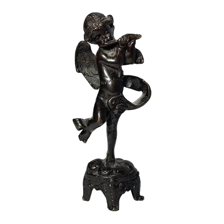 Antique Early 1900s French Cherub Putti Playing Flute Bronze Statuette: Antique bronze statuette from the early 1900s, featuring a charming depiction of a French cherub or putti playing a flute. The statuette stands at a height of 5.75 inches, with a length of 2.5 inches