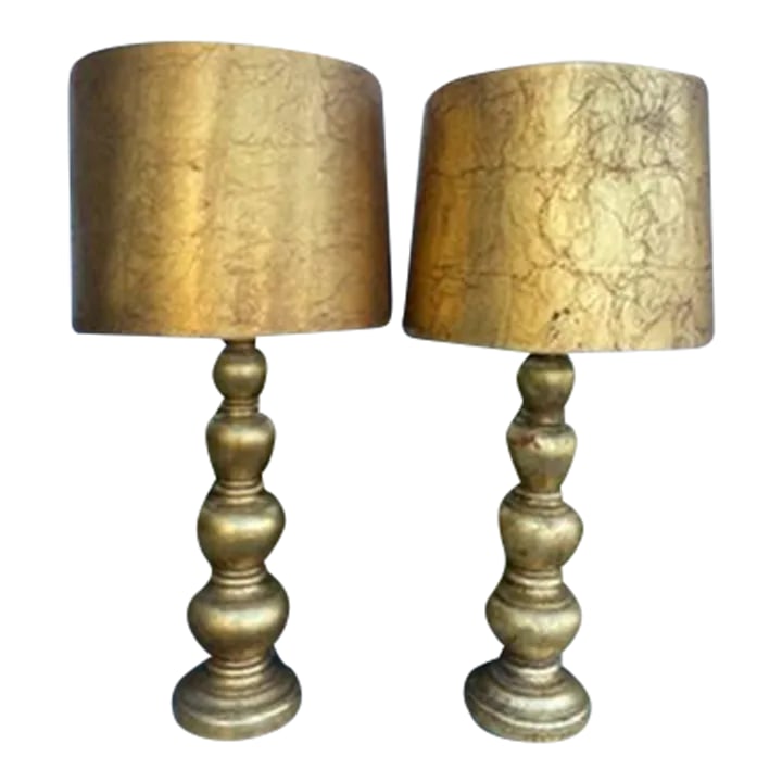 Vintage Gold Leaf Lamp Lamps - a Pair: Gorgeous gold leaf lamps with paper gold leaf shade. Beautiful red patina comes through in a few spots. Glass shade inside to reflect light up. Would make a great statement piece in any space! A real 