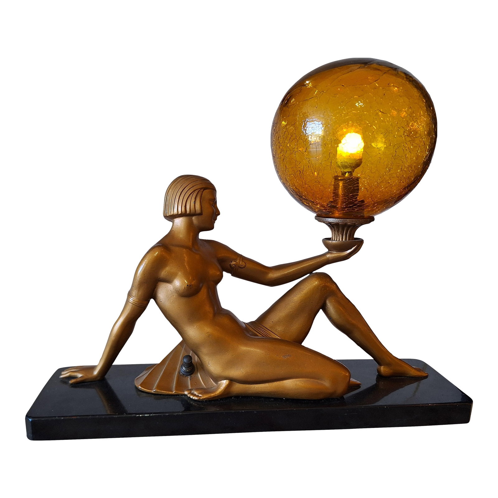 1930's Art Deco Sculpture "Lady Lamp": An Art Deco spelter lady lamp, circa 1930, Germany. One of a kind with art glass. Length 14.5" x Height 12". Wear and tear accordingly to its age. Original glass globe. Rewired. Condition: