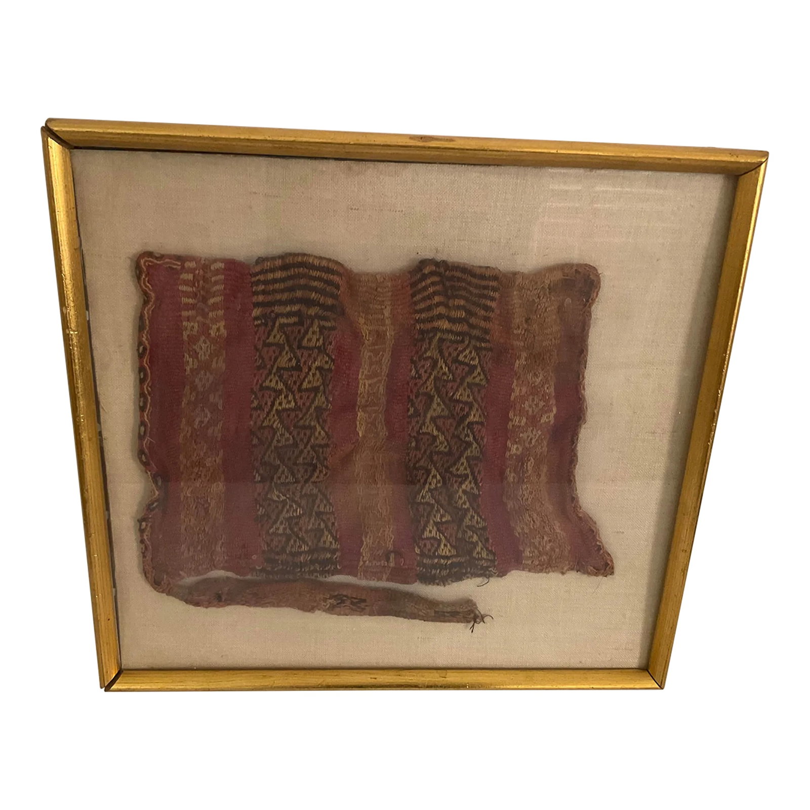 Pre Columbian Chimu Textile Satchel: A Pre-Columbian Chimu textile satchel. A rare find! A geometric design mounted on linen and housed under a gilt frame. It dates from 940 AD to 1470 AD. Condition: Alterations: Original Condition Unalt