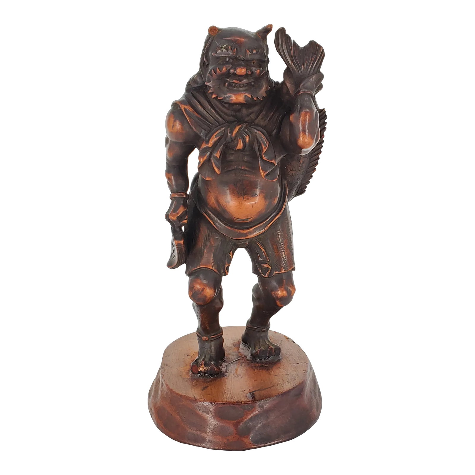 Early 20th Century Japanese Oni Wood Carving Okimono Demon Figure Fish Sculpture Meiji Period: Antique Japanese from the Meiji period, carved wood (possibly boxwood) figure of a monstrous Oni figure carrying a large fish on his back and a book in his other hand. Dating between 1868 and 1912.
