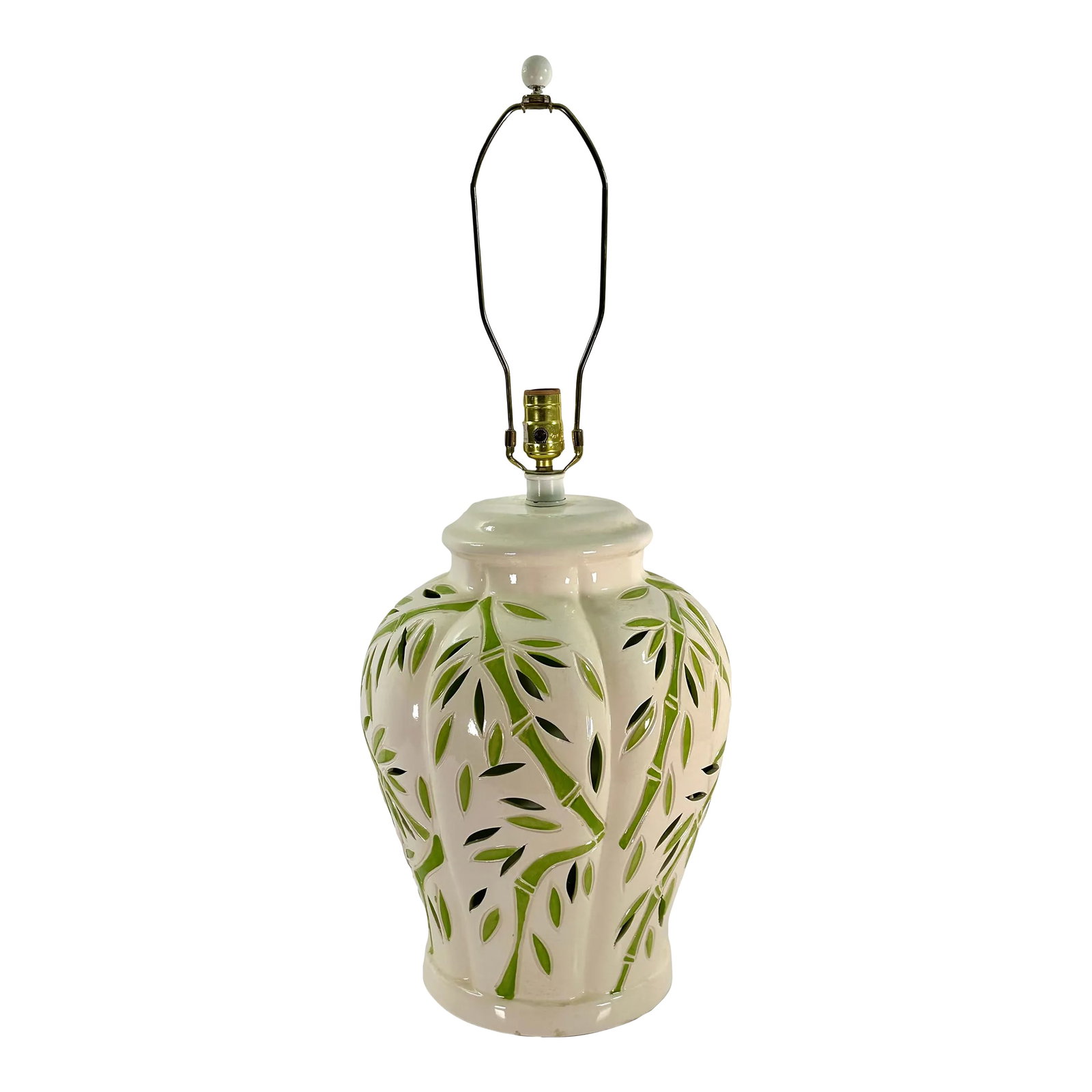 Palm Beach Regency Double-Lit Pierced Ceramic Bamboo Table Lamp: Large scale vintage table lamp from Sunset Cosco Lamps. The glossy cream base has hand cut foliate slits and an interior light within a fabric diffuser. Each leaf is outlined in chartreuse green, echo