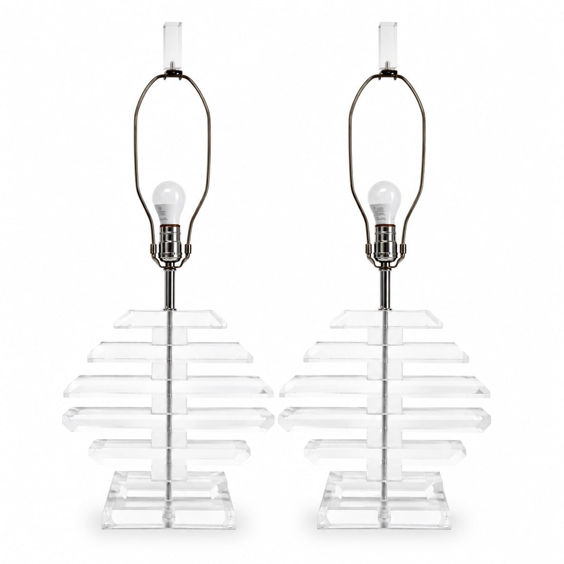 1970s Multilayer Lucite Table Lamps - a Pair: Beautiful pair of vintage 1970s multilayer lucite table lamps. Thick pieces of lucite making a diamond shape. Perfect pieces for any living space. 27.5 height 12 wide 4 deep Condition: Alterations: Or