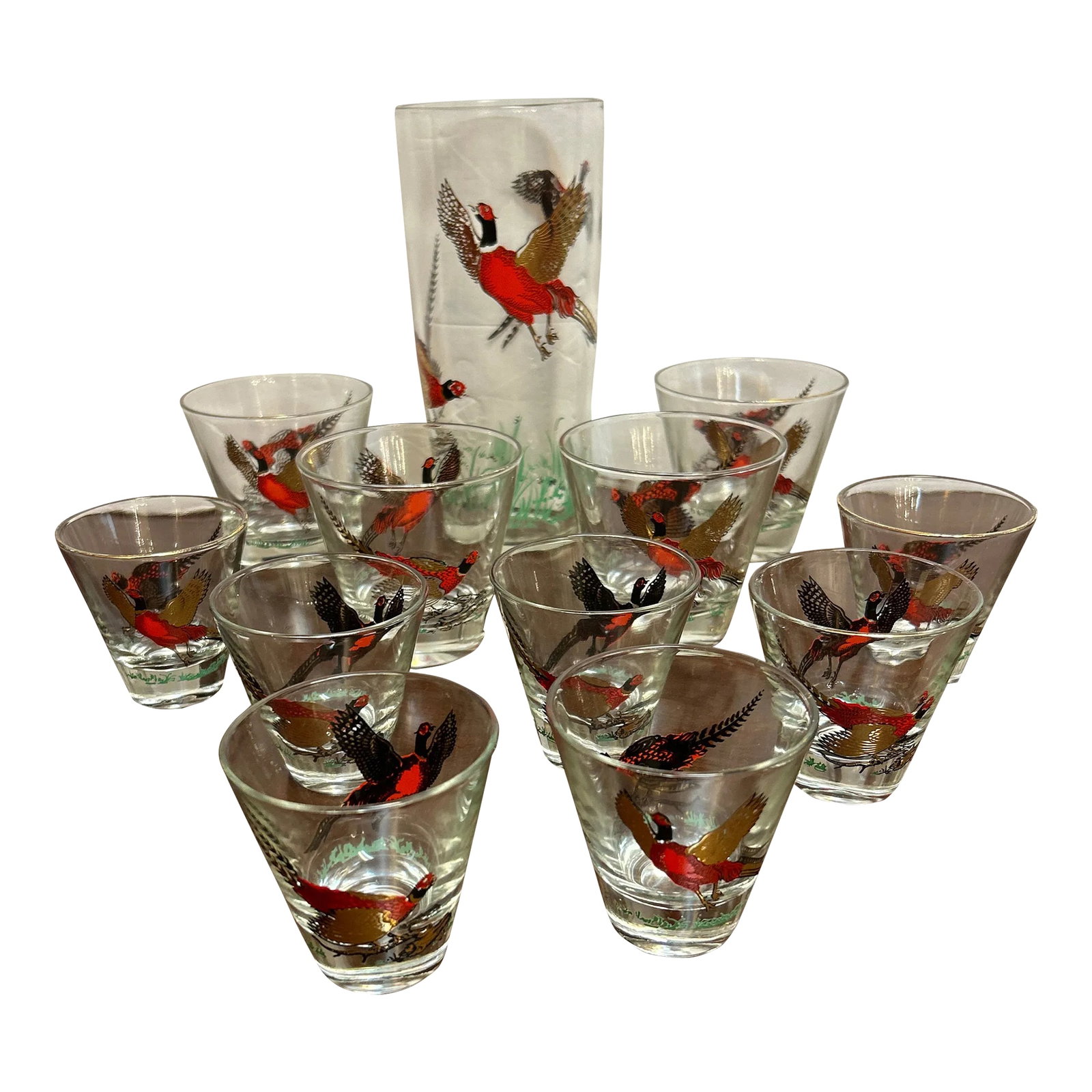 Mid Century Modern Wilderness Glass Cocktail Pitcher and Glasses Set of 12 Pieces: Great mid century modern set of cocktail glasses with pitcher. It's a 12 piece set with 2 size glasses. This set depicts flying birds and grass. Very attractive and fun for parties. Great for a