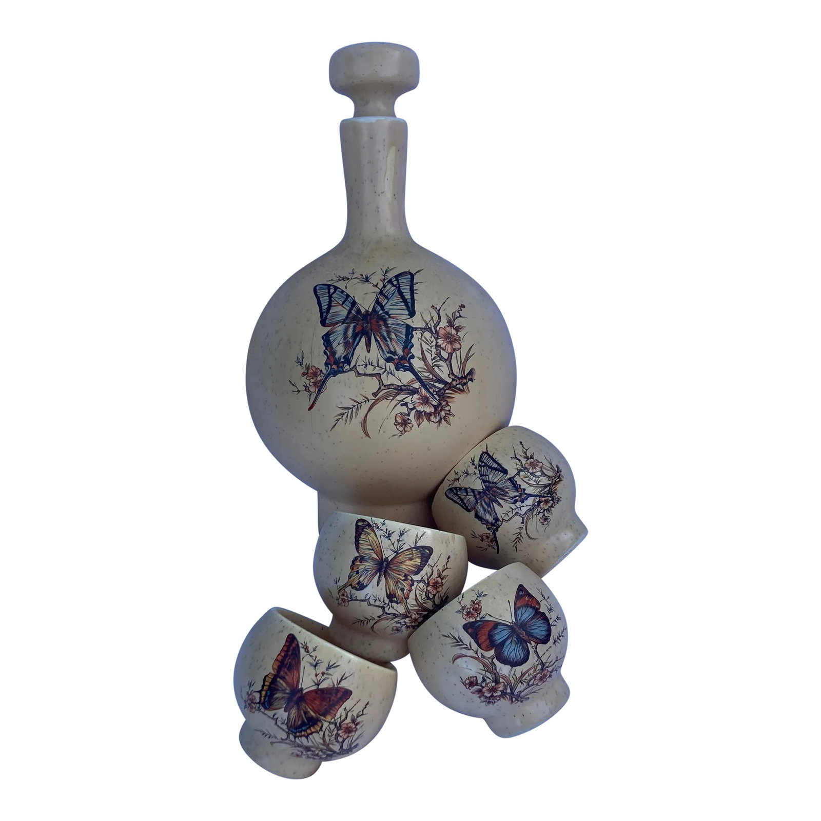 Vintage Treasure Craft Butterfly Decanter With Cups Set- 5 Pieces: This vintage Treasure Craft set is in good condition . The decanter has a strip of wear or manufacturing defect at the tip of the neck . Please see photos . The decanter is approximately 9 inches