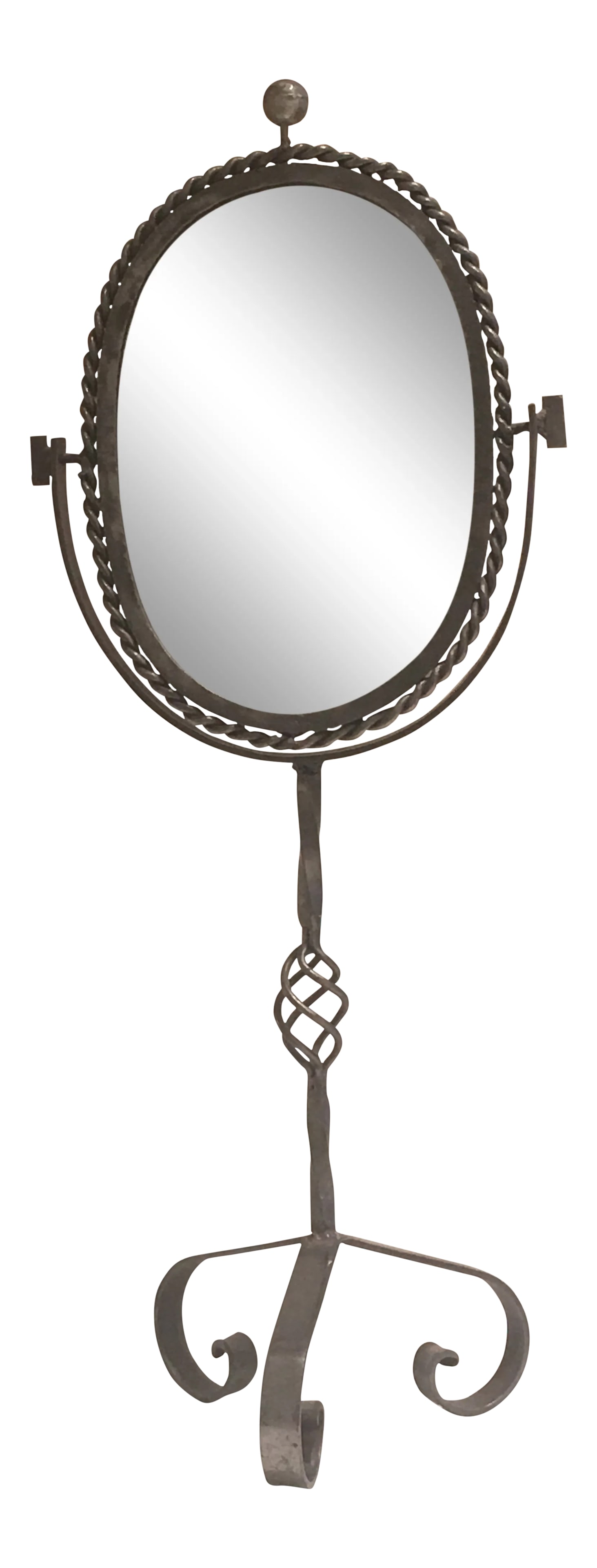Late 19th Century Antique French Polished Steel Tripod Table Mirror: This is a French polished steel table mirror with curved steel detailing, set on Tripod legs, with a rotating mirror. The Mirror back is currently covered in a pale striped silk and could be changed