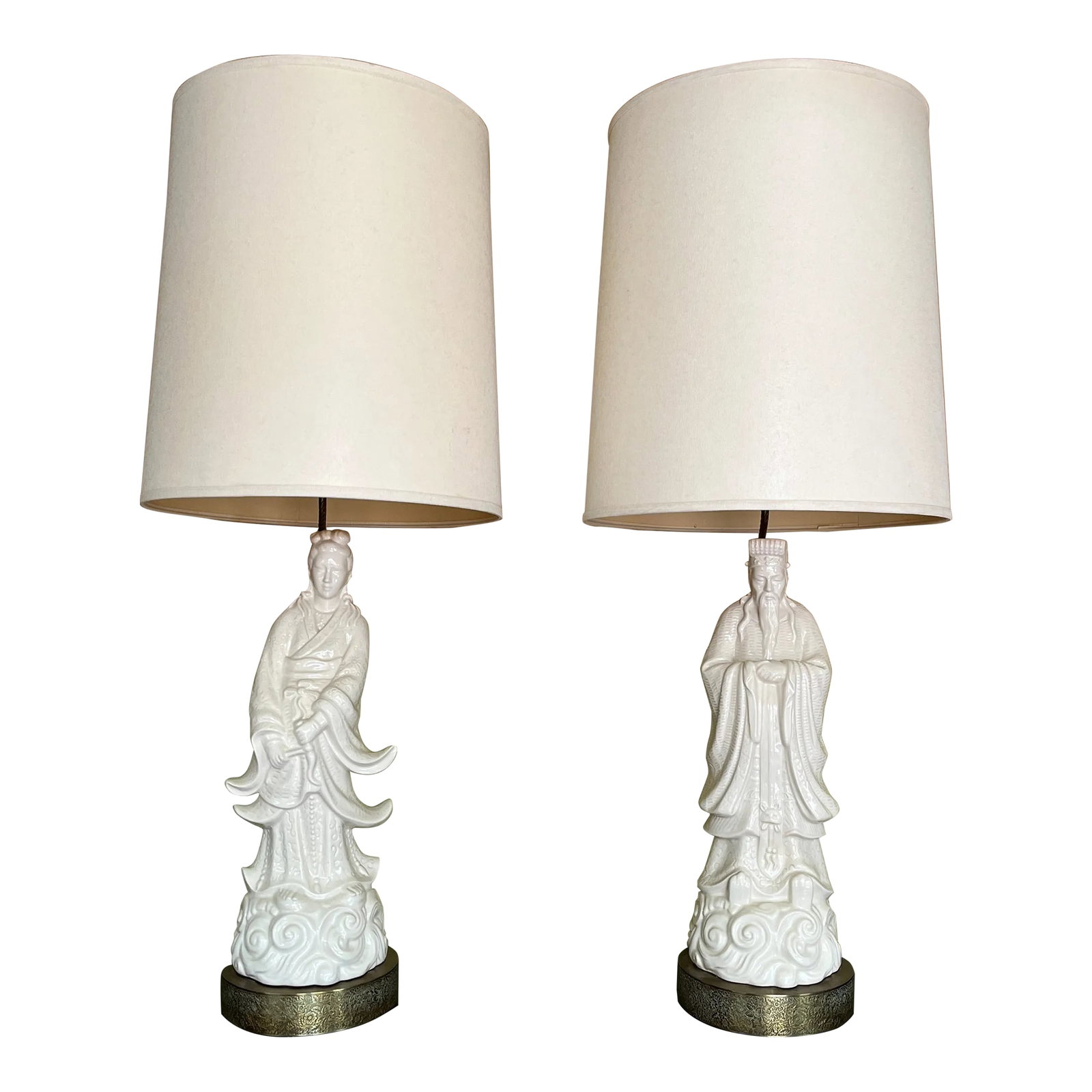 1950s Chinoiserie Blanc De Chine Figural Table Lamps Large Scale- A Pair: A beautiful pair of larger chinoiserie figural lamps. The lamps measure 43" tall with the shades. Without the shades up to the top of the figure's head they measure 23" and to the top of the harp they