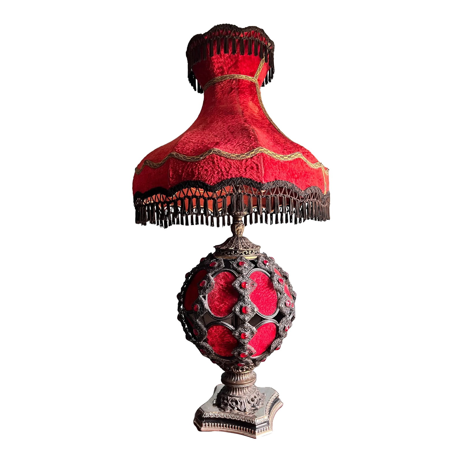 Mid 20th Century Falkenstein Victorian Gothic Revival Red and Black Table Lamp: This large, ornate table lamp by Carl Falkenstein combines elements of Hollywood Regency, Victorian and Gothic Revival design. This incredibly rare style still has its original shade and belongs on th
