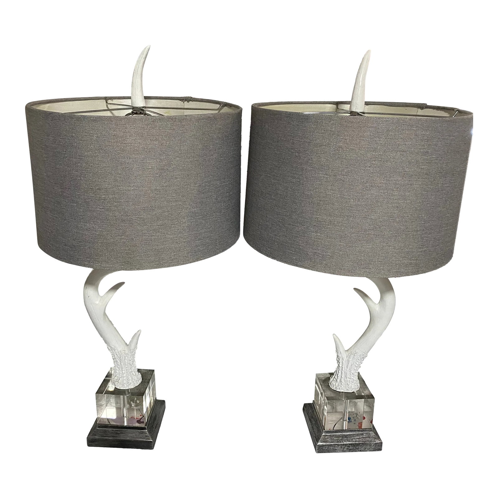 Pair of Midcentury Modern Faux Horn Lamps on Lucite Base: midcentury modern style this pair ticks all the boxes quality- pol. correct - lucite - finial is a plus chalky white wash 1000% winner Condition: Alterations: Original Condition Unaltered Imperfection