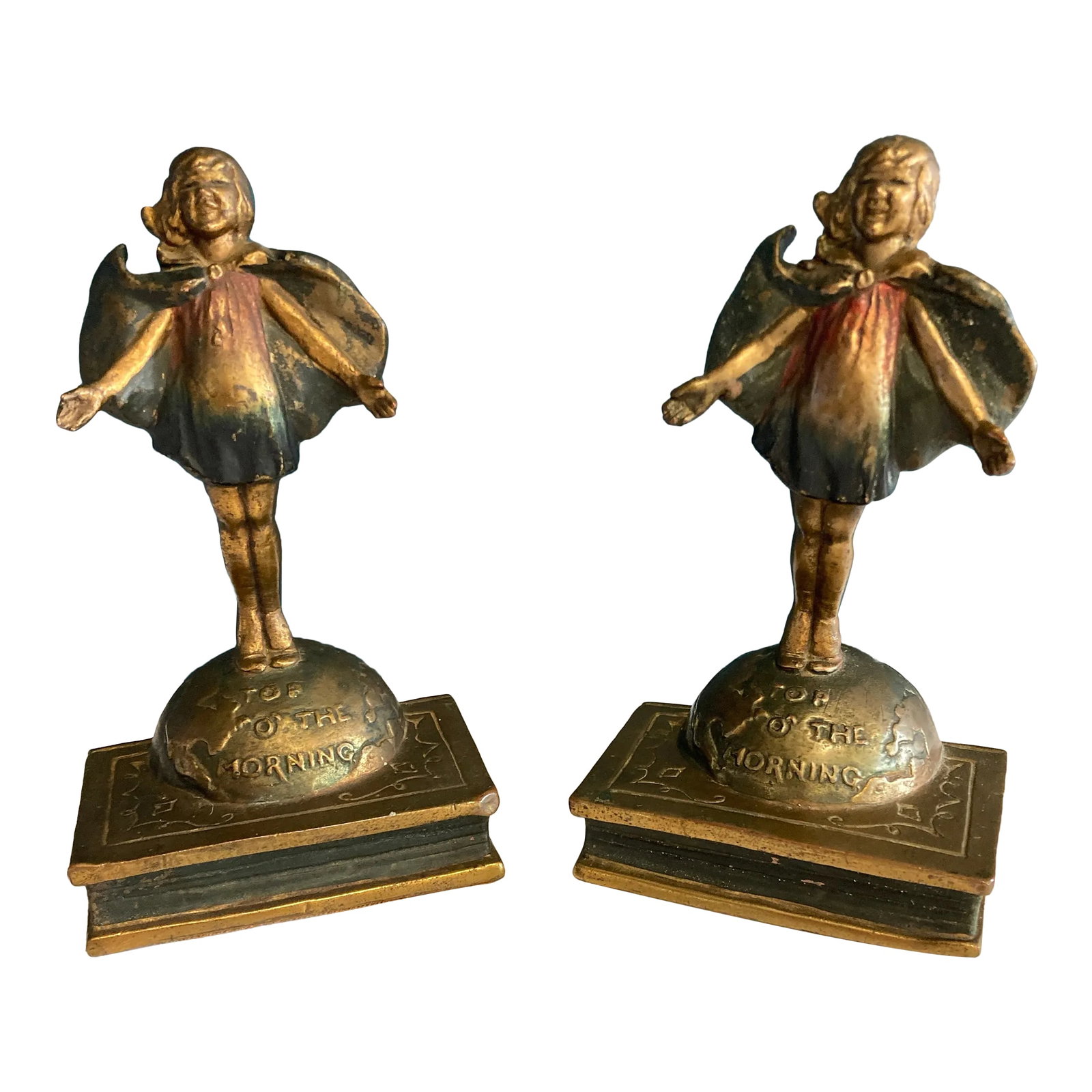 1920s Pompeian Bronze Bookends by Laura Archibald "Top of the World" - 2 Pieces: Bring timeless charm to your vintage finds collection with this set of 1920s bronze bookends, featuring a young girl with a cape standing in the wind atop a globe and a book inscribed with the raised 