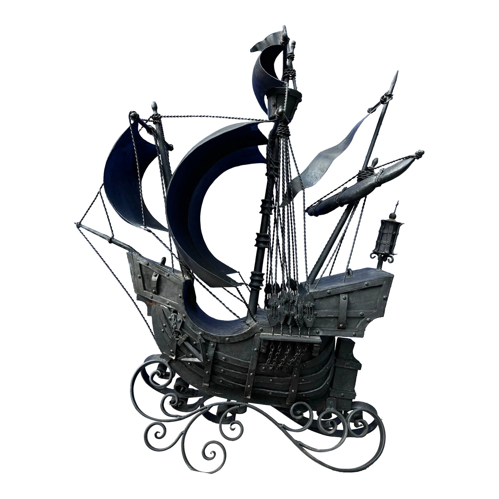 Vintage Hand Forged Black Metal Pirates Ship: Charming hand-forged iron sailing ship sculpture This striking dark-metal sculpture captures the romance of the high seas in solid iron. A multi-masted galleon rides a graceful wave of scrolling