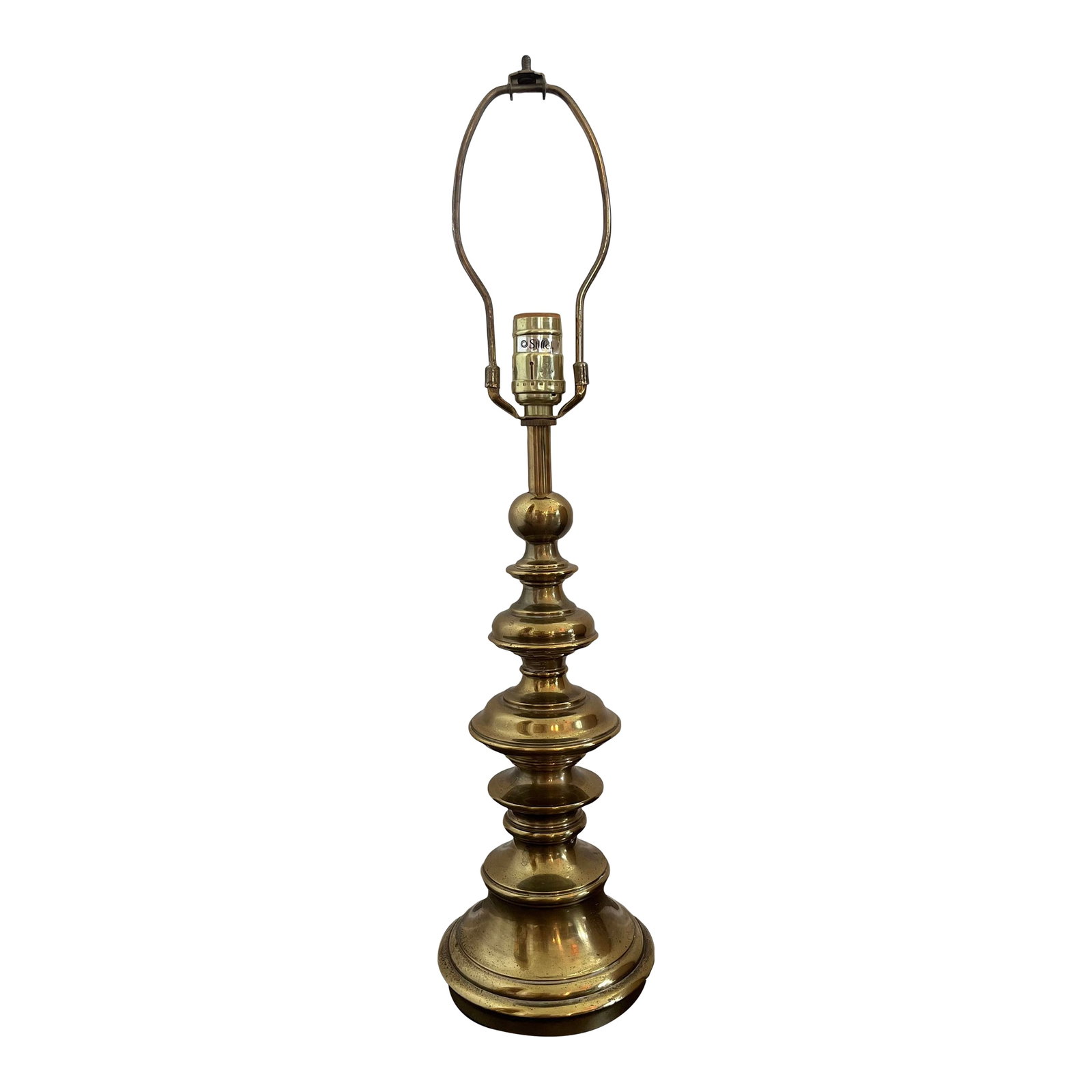 Vintage Brass Stiffel Lamp: The classic brass Stiffle lamp. You can feel the quality in the weight of the lamp. Can be used to decorate almost any style of room. This is truly an iconic piece. Condition: Alterations: Original Co