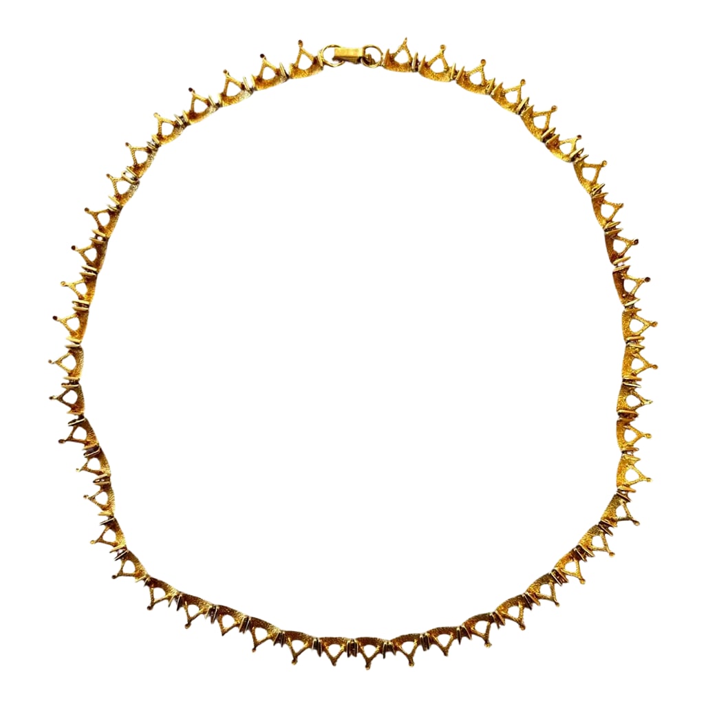 Vintage 14k Yellow Gold Crown Necklace: Vintage 14-karat yellow gold articulated crown necklace. 17 inches. Each crown is 3/8 long and 3/8 wide. Condition: Alterations: Original Condition Unaltered Imperfections: Some Imperfections