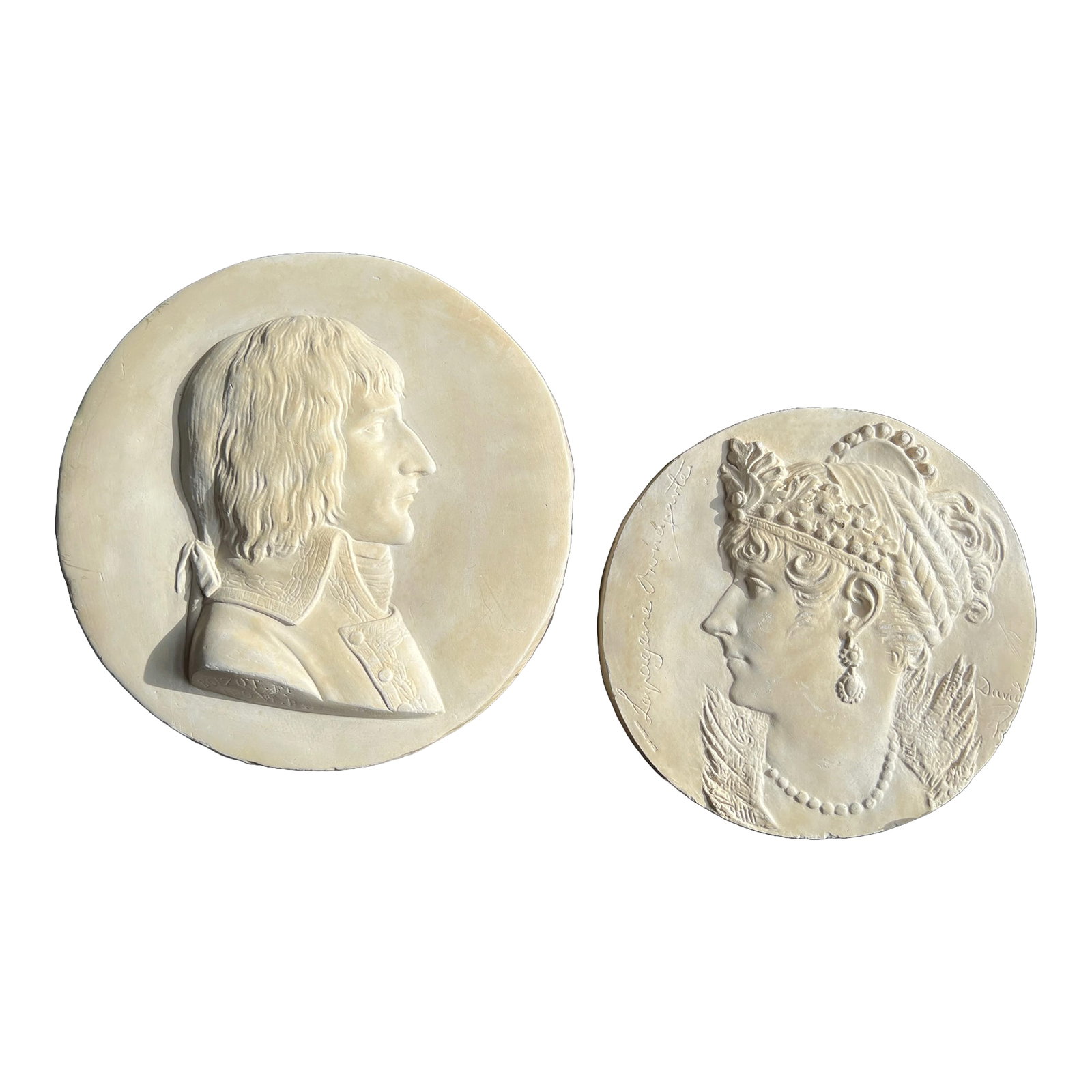 1950s Napoleon and Josephine Bonaparte Plaster Medallion Plaques - a Pair: These are plaster medallion plaque replicas of bronze originals General Bonaparte by Boizot and Josephine Bonaparte by Pierre-Jean David d'Angers (1788-1856). An extremely rare pair. These replicas