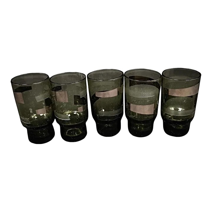 Mid 20th Century Vintage Green Crystal Liqueur Glasses- Set of 5: This elegant set of 5 liqueur glasses is crafted from fine crystal, featuring a beautiful green hue that adds a touch of sophistication to any setting. Ideal for special occasions or as a lovely