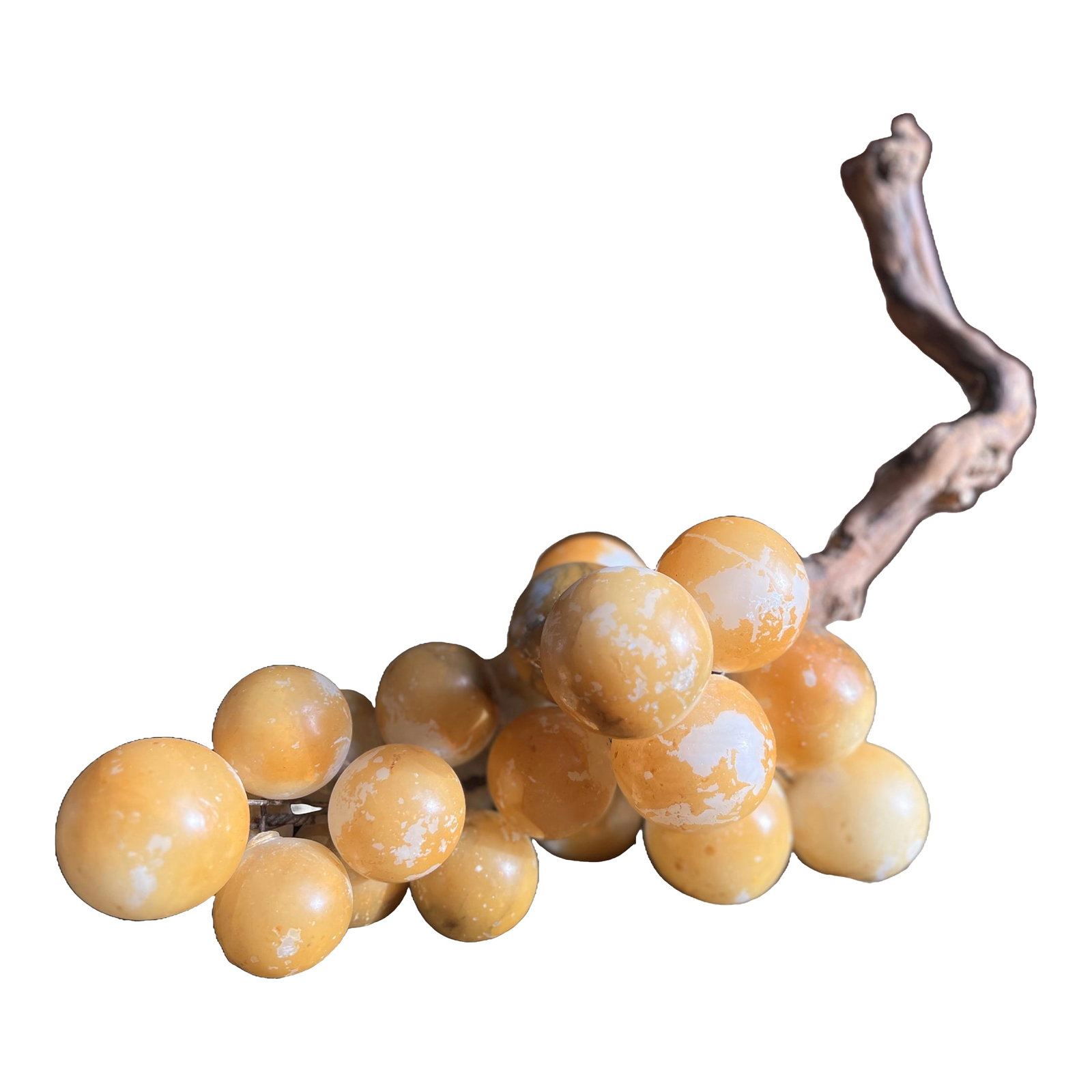 Vintage Italian Natural Alabaster Stone Grape Cluster With Natural Grape Vine: An Italian mid-century alabaster sculpture of grapes, intricately carved from high-quality stone and painted a translucent deep yellow that showcases the alabaster's natural variations and elegance
