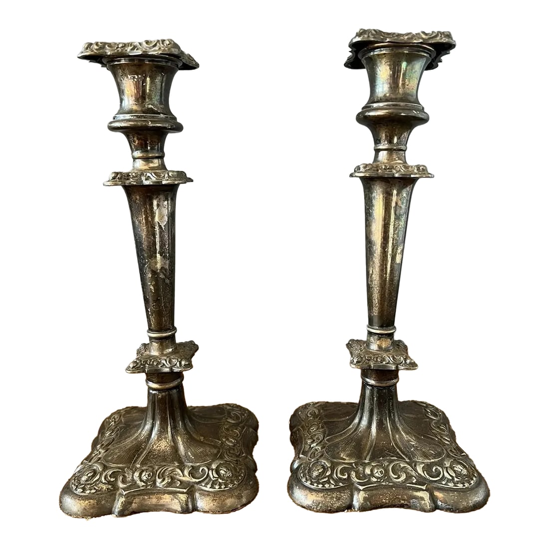 Pair of 1920s Victorian Silver Plate Candle Holder: A pair of antique quadruple silver plate candle holders. Stunning pieces! Beautifully detailed with scroll and floral design. They look great on a dining table or mantle. Dress them with greenery at