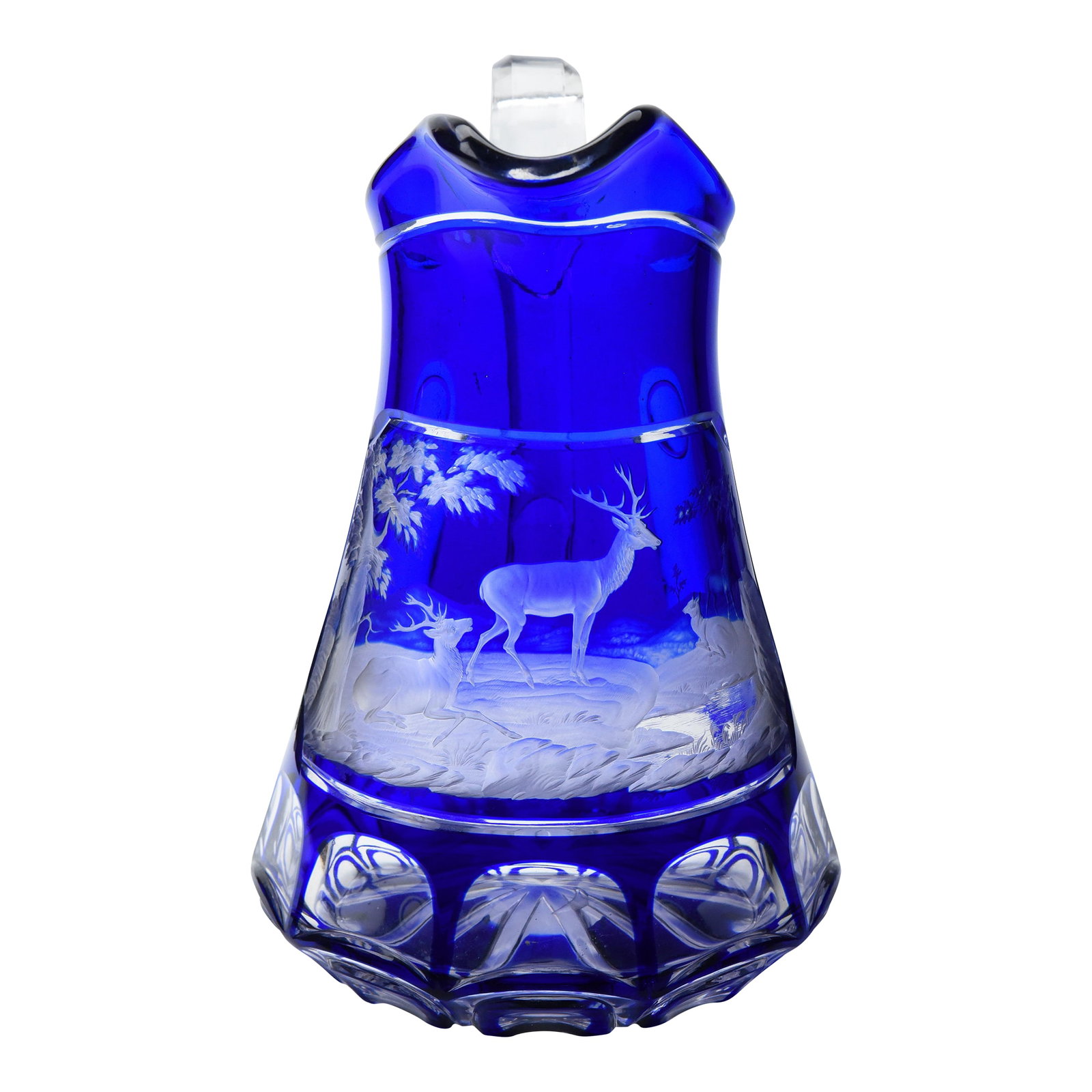 Mid 19th Century Cobalt Engraved and Cut Overlay Glass Pitcher: Description - A large and beautiful cobalt blue glass pitcher with applied clear glass handle. It is decorated with a beautifully detailed scene of several stags, one laying beside a tree, one