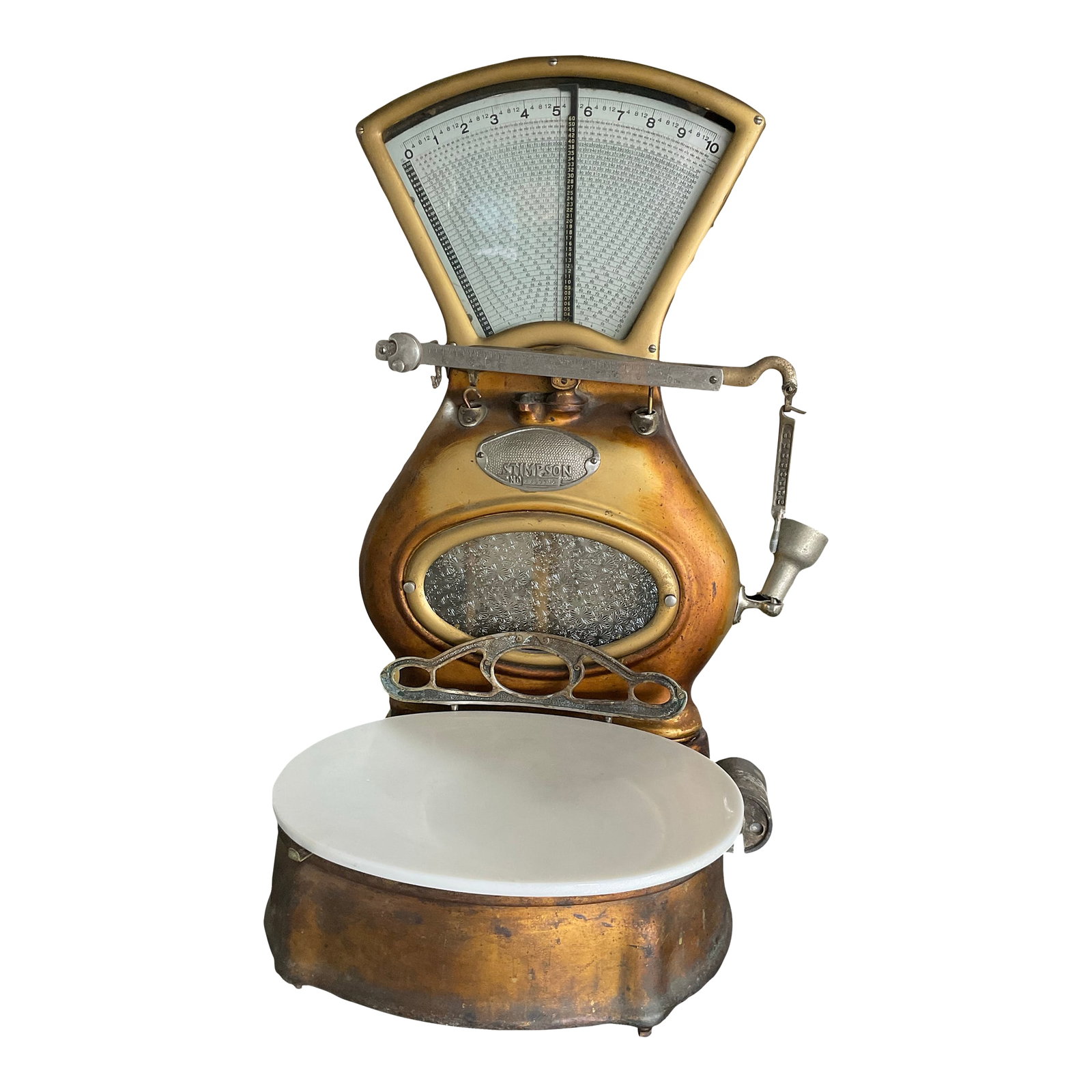 Early 1900's Stimpson Computing Scale: Antique Stimpson Computing Scale. Made in Louisville, Kentucky. In amazing shape. Comes with weights. The only damage is missing glass in the font right corner. This is a great, nostalgic display item