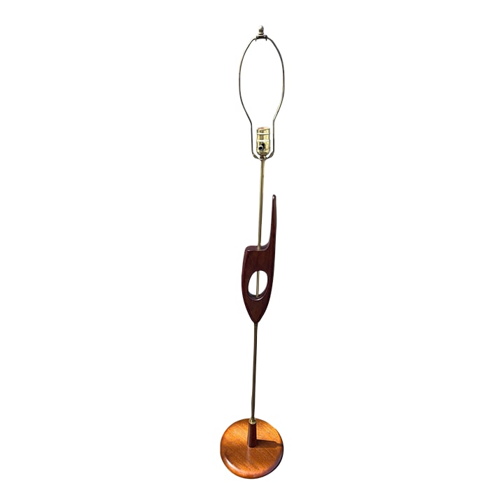 Danish Mid Century Teak Floor Lamp 1970s: This stunning Danish mid-century teak and brass floor lamp from the 1960s-1970s showcases a perfect blend of vintage charm and modern functionality. Fully rewired and polished, it not only adds a