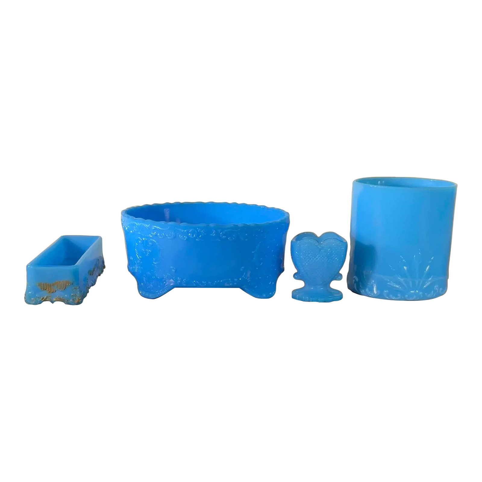 Rare & Radiant Blue Milk Glass Collection: Fenton & More - A Must-Have: exquisite set of four vintage blue glass pieces, perfect for adding a touch of classic elegance to any home or collection. This captivating ensemble features what appears to be a stunning Fenton Blue 