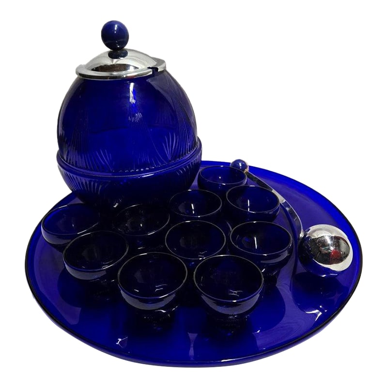 Cobalt Blue Glass Punch Bowl With 10 Cups, Ladle and Large Display Tray- 13 Pieces: This punch bowl and accessories are so unique and beautifully designed! All are in great condition, with no significant chips or scratches. The ladle has some chipping on the ball handle, and the