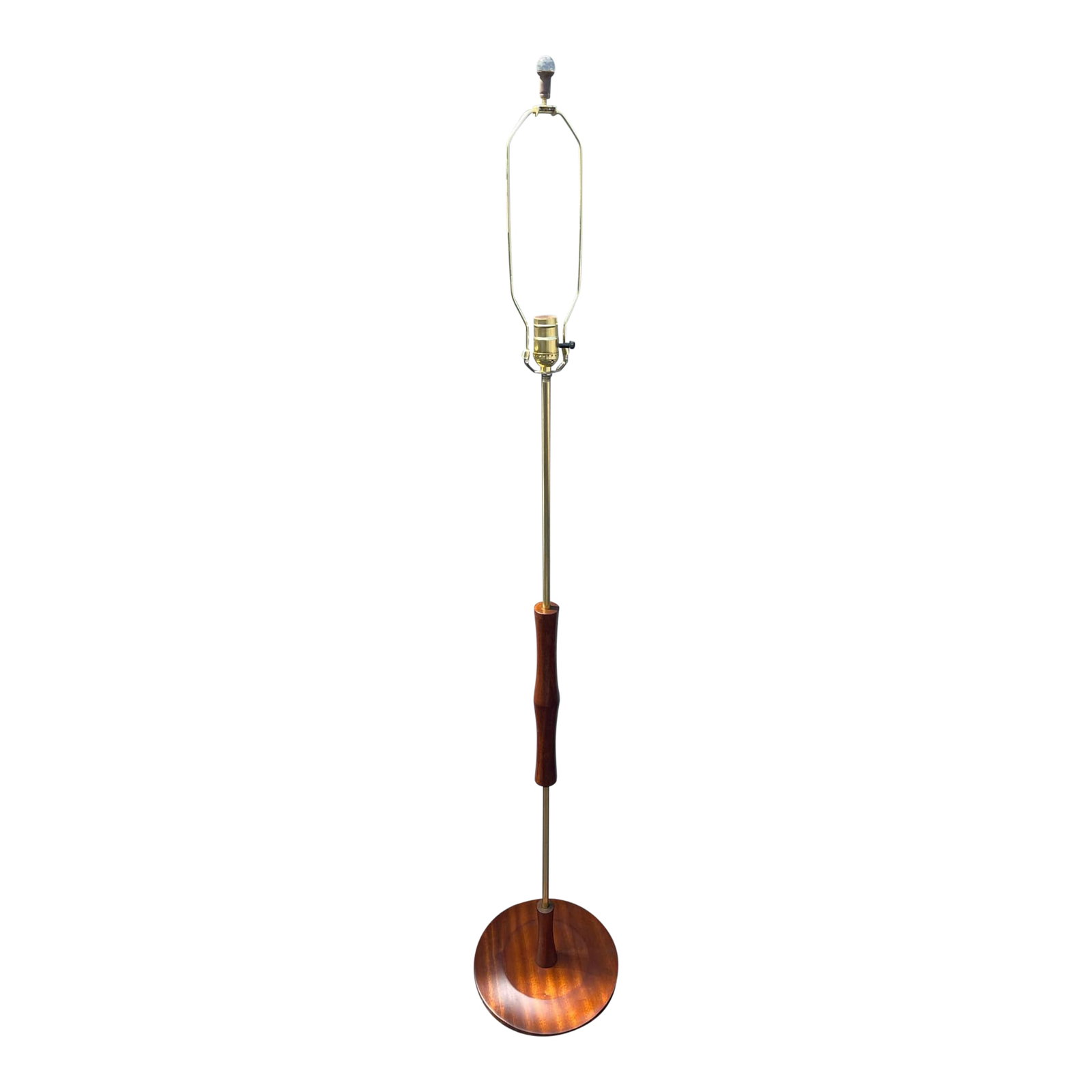 Danish Mid Century Teak Floor Lamp: This stunning Danish mid-century teak and brass floor lamp from the 1960s-1970s showcases a perfect blend of vintage charm and modern functionality. Fully rewired and polished, includes the harp. It n