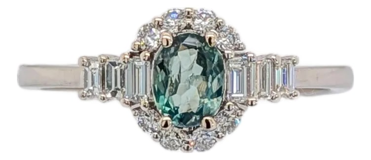 Alexandrite Ring With Natural Diamonds in Solid 14k White Gold, Oval 5.5x4mm: A gemstone like no other-this color-changing Alexandrite captivates with its shifting tones, beautifully complemented by earth-mined diamonds in a solid 14K white gold setting. A timeless piece that