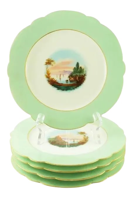 Early 20th Century Old Paris Style Porcelain Hand-Painted Landscape Scenes Cabinet Plates - Set of 5: A set of five Old Paris style porcelain plates. Each plate has been hand-painted with enamel in shades of browns, greens, and blues. The scalloped and gilt-edge plates have a sea green border along