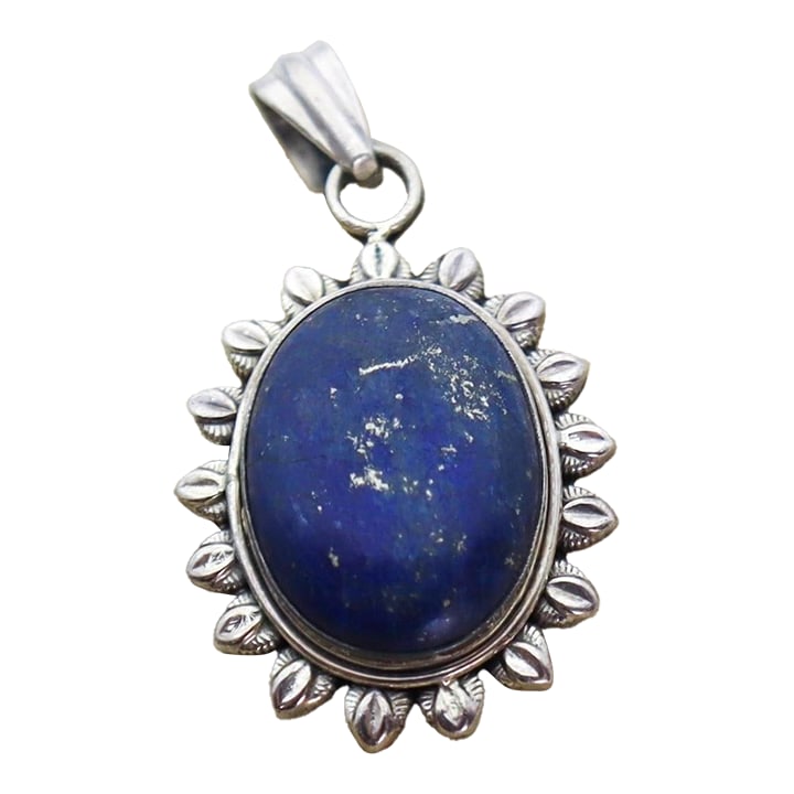 Vintage Lapis Lazuli in Sterling Silver Starburst: A dazzling vintage lapis lazuli gemstone resembling the night's sky full of golden stars, set in a sterling silver starburst. It is a beautiful artist made pendant with silver detailing and a real