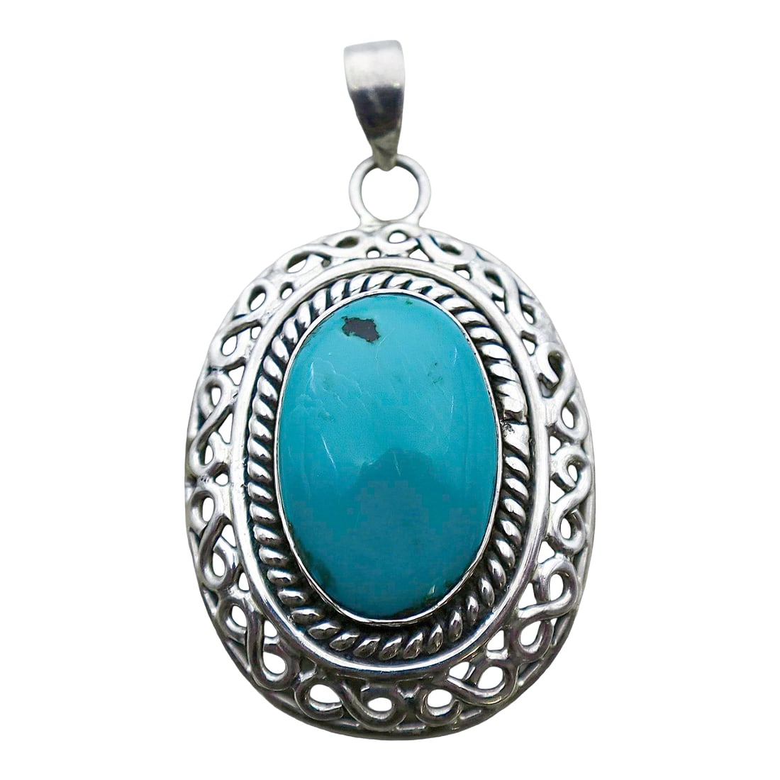 Vintage Natural Turquoise With Sterling Silver Detailing: Lovely bright turquoise set in masterfully detailed sterling silver. Admired since ancient times for its striking color, turquoise is a stunning adornment that's increasing in rarity. This vintage