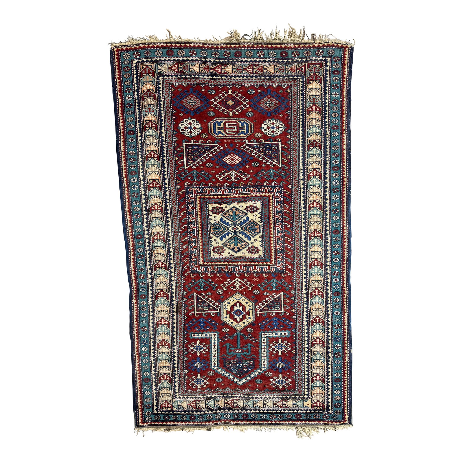 Late 19th Century Caucasian Shirvan Prayer Rug (Karagashli Type): This rug is an authentic late 19th-century Shirvan prayer-format piece from the eastern Caucasus, woven in the Karagashli stylistic tradition. Its elongated proportions, directional field