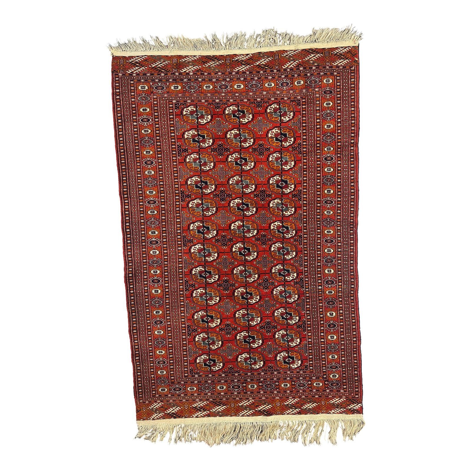 Tekke-Pattern Rug (1951) With Factory Seal: This is a mid-20th-century Tekke-pattern rug woven in 1951 inside a Soviet state-regulated weaving workshop. The rug preserves the traditional Tekke gul arrangement, classic red ground, repeating octa