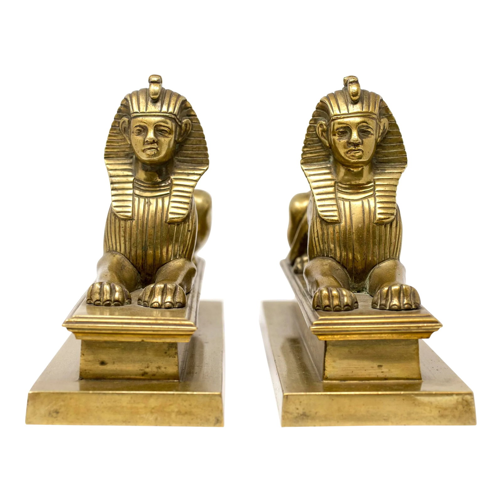 Pair of Mid 19th Century Egyptian Bronze Sphinx Figurines: This statuesque pair of 19th Century Sphinx were found in England in the Cotswalds. They are very heavy bronze. c. 1850 Condition: Alterations: Original Condition Unaltered Imperfections: Some