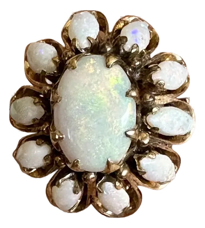 Late 20th Century 18k Gold and Opal Ring, Size 6.25: Gorgeous 18k gold and opal ring. Center stone is a large oval opal surrounded by 10 marquis shaped opals. The color on all of these is lovely, and my pictures don't do it justice. Measures 25mm top