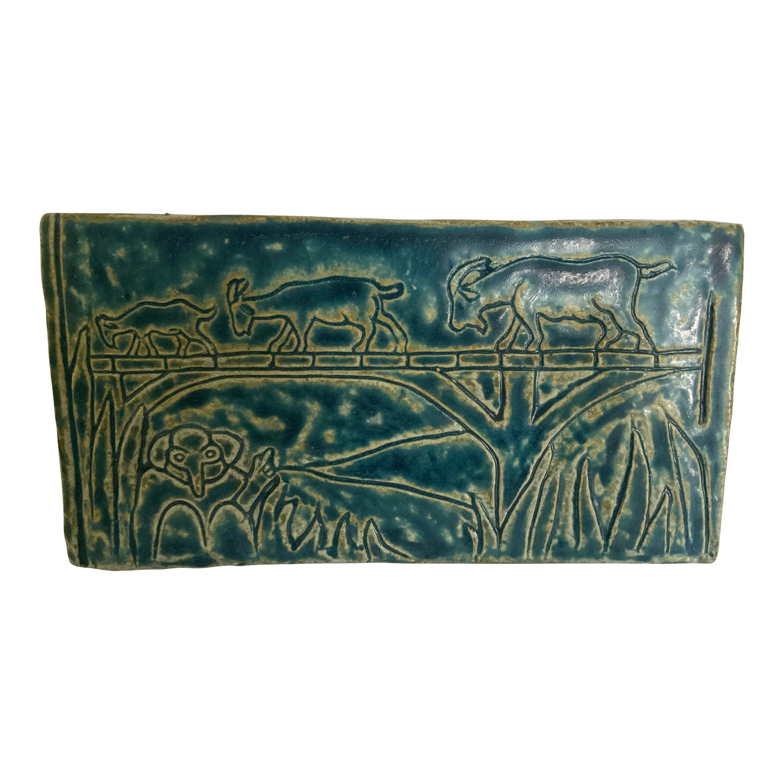 Pewabic Pottery Ceramic Plaque: Pewabic Pottery is a ceramic studio in school in Detroit Michigan. Founded in 1903. The Pewabic pottery is known for its iridescent glaze. This stunning Pewabic plaque depicts representations of goats