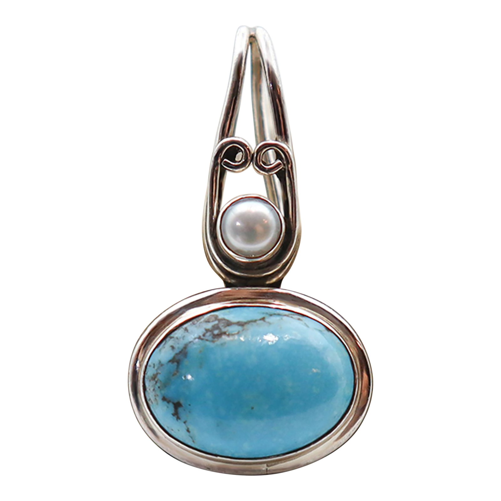 1990s Vintage Turquoise & Pearl Set in Sterling Silver: Lovely bright turquoise and soft shining pearl set in sterling silver. Admired since ancient times as stunning adornments, turquoise and pearls are increasing in rarity. Royal and wealthy families