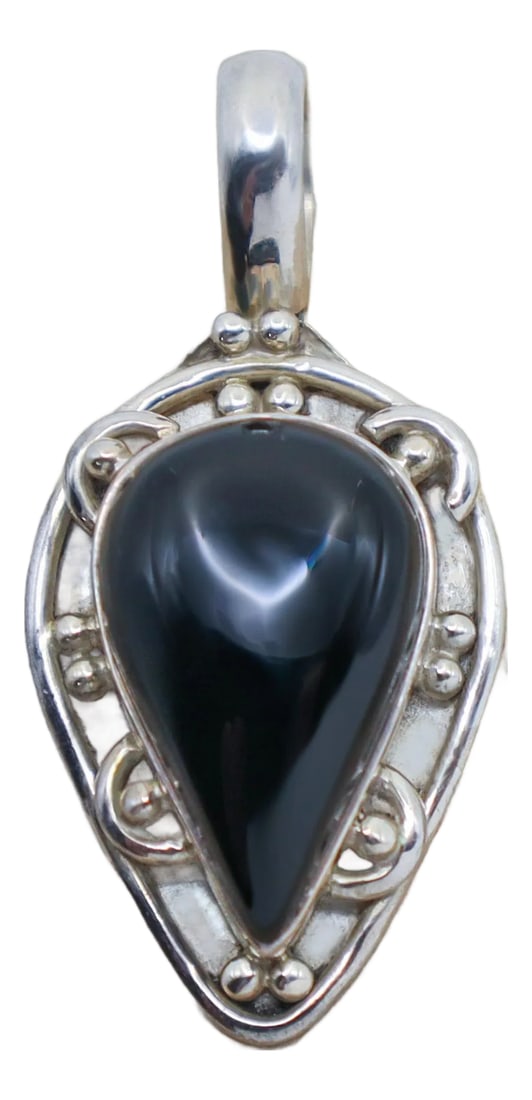 Vintage Onyx "Pie" Pendant in Sterling Silver: A great addition for the holiday season. This vintage natural onyx gemstone pendant is a classy piece that's also shaped like pie to add to the festive fun. Set in sterling silver with a masterful