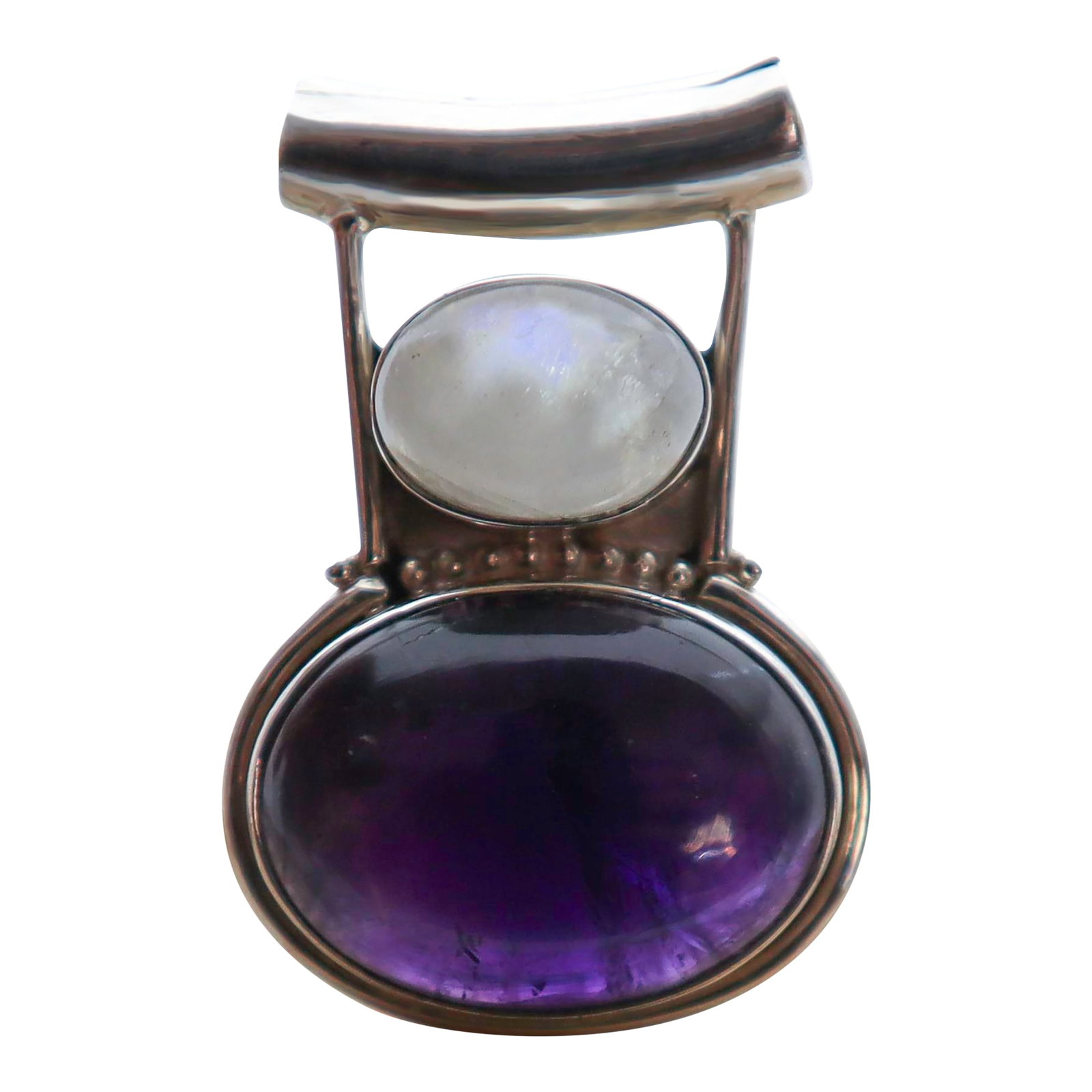 Deep Purple Amethyst With Moonstone in Sterling Silver: Vintage amethyst and moonstone pendant set in sturdy sterling silver for a modern or tribal appeal. This piece encapsulates the past, present and future beauty. It's a precious reminder that some of
