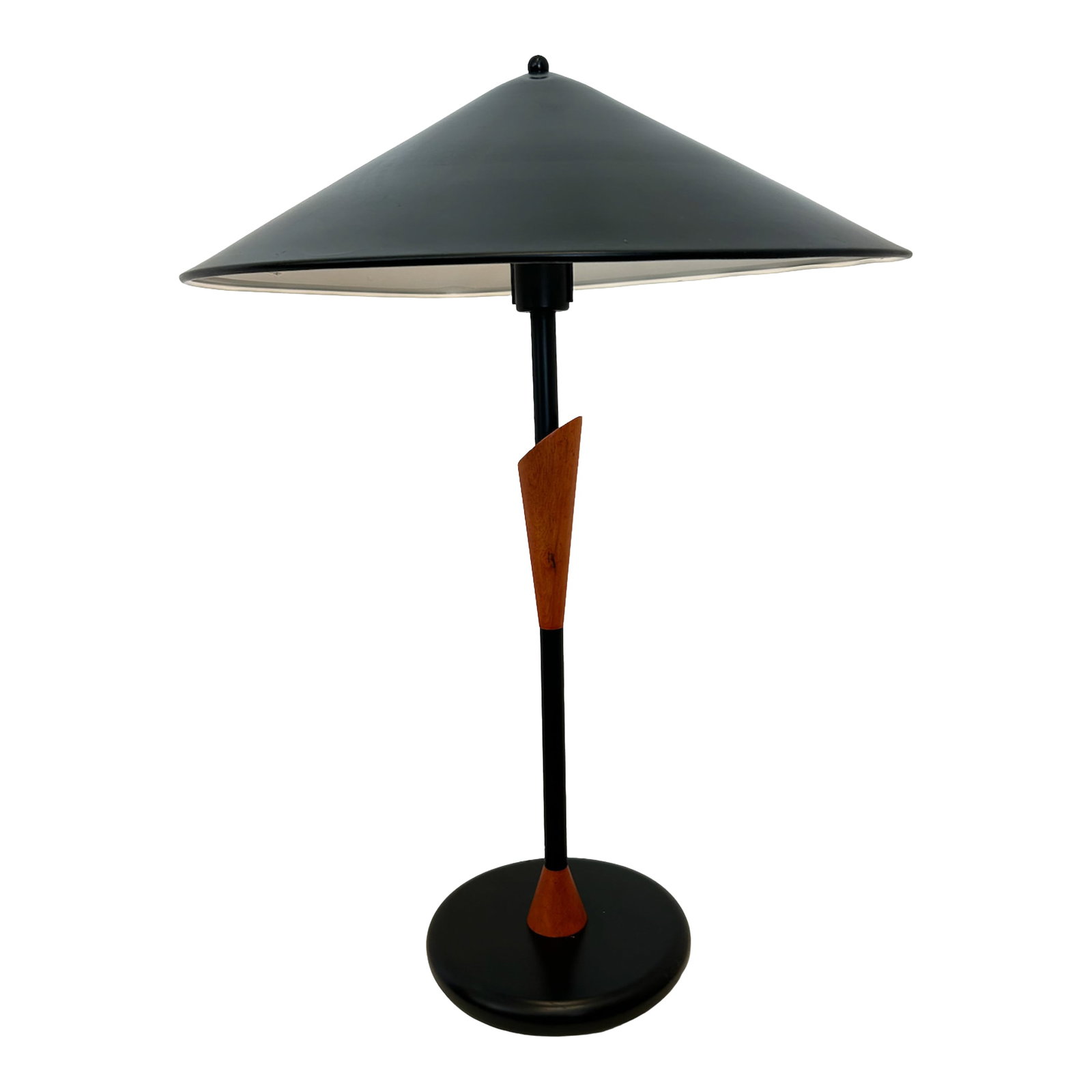 Vintage Postmodern Metal and Wood Table Lamp: Vintage postmodern table lamp with black metal cone shade and sculpted wood accent. Features a circular black base and single standard socket. Measures 27"H * 18.5" diameter. Light surface wear
