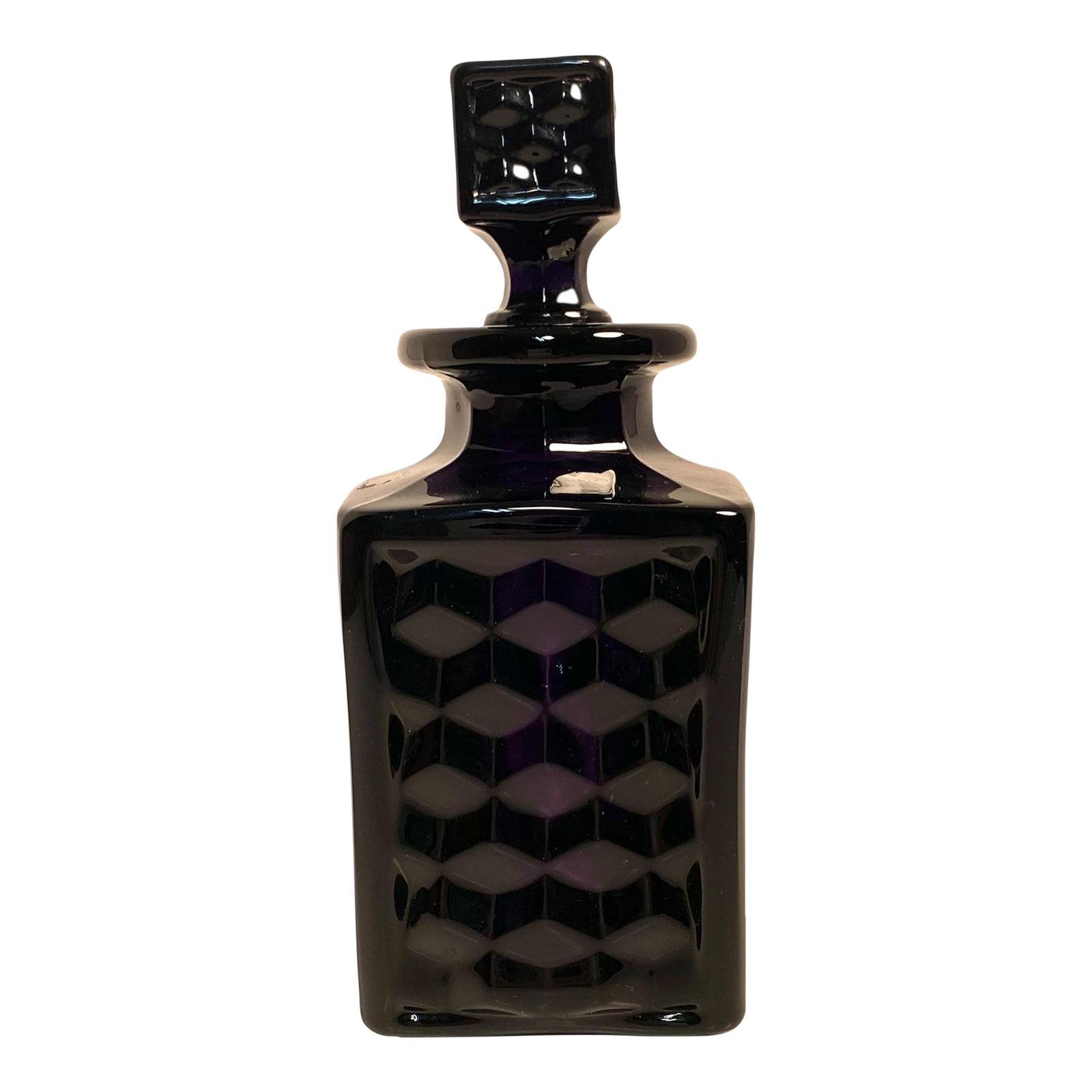 Mid 20th Century Mid-Century Fostoria Amethyst Glass American Pattern Decanter: This Mid-Century Fostoria decanter features the classic American cube pattern, molded in thick glass. The squared body and matching geometric stopper exhibit the sharp facets and weight associated