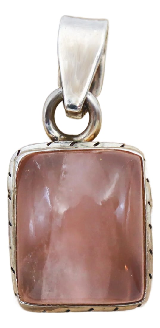 Vintage Rose Quartz in Sterling Silver Pendant: Rose quartz forms over millions of years, generally 10 million to be fully formed. Meaning this gemstone has been through quite the journey and test of time for the opportunity to be adorned by you.