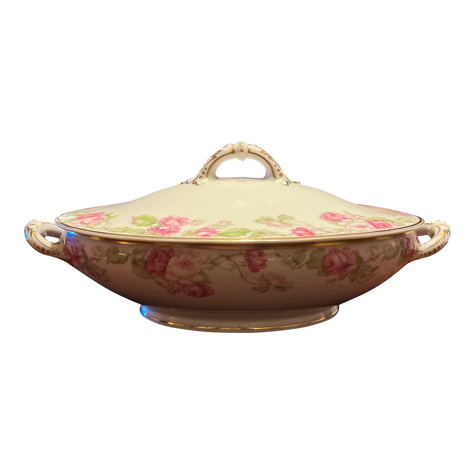 1900s Haviland Limoges for Dulin & Martin Footed Tureen Featuring Roses: Beautiful Haviland & Co (for Limoges France) footed vegetable tureen features: - roses in hues of pink and green - handles detailed with gold - the rims of the cover and base detailed with gold trim