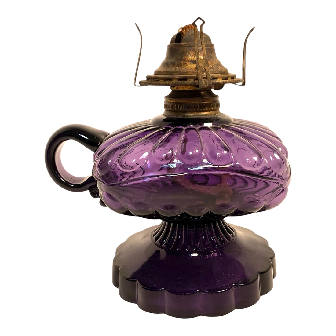 Circa 1900 Amethyst Glass Square Body Finger Oil Lamp Victorian Style: This antique finger oil lamp dates to circa 1900 and features a distinctive square-body design in richly tinted amethyst glass, its color developed through irradiation of manganese-based glass typical