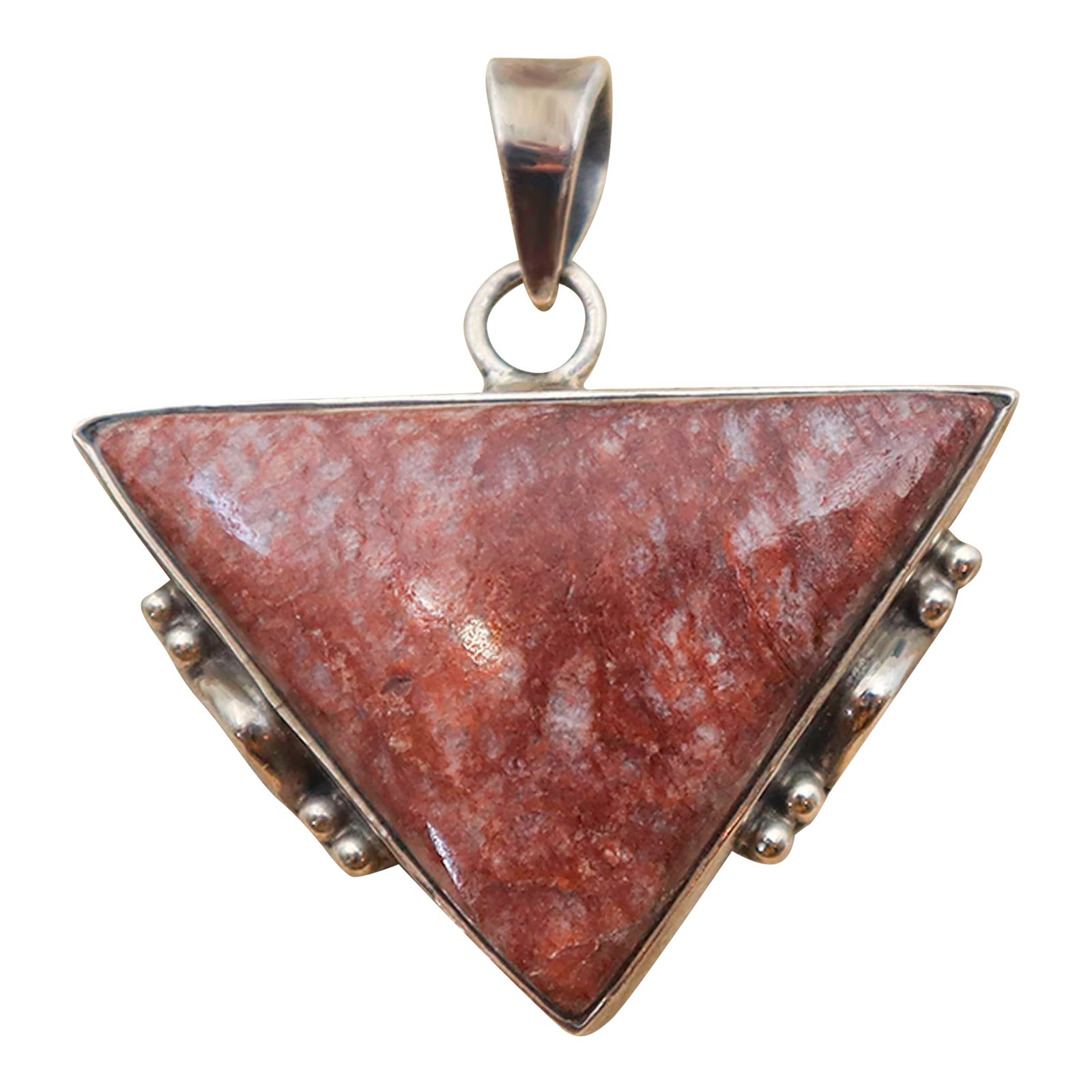 1990s Vintage Burgundy Jasper & Sterling Triangle Pendant: Contemporary burgundy triangular cut jasper set in sterling silver. A beautifully earthy gemstone for a natural color pallet or pop of color. Markers mark 925 for sterling silver. It is written that