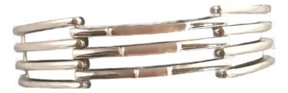 Armani Sterling Bracelet: You will never want to take this Emporio Armani sterling bracelet off! It is so comfortable and a great weight, 48 grams. Fashioned in three articulated sections, with a very secure foldover clasp.