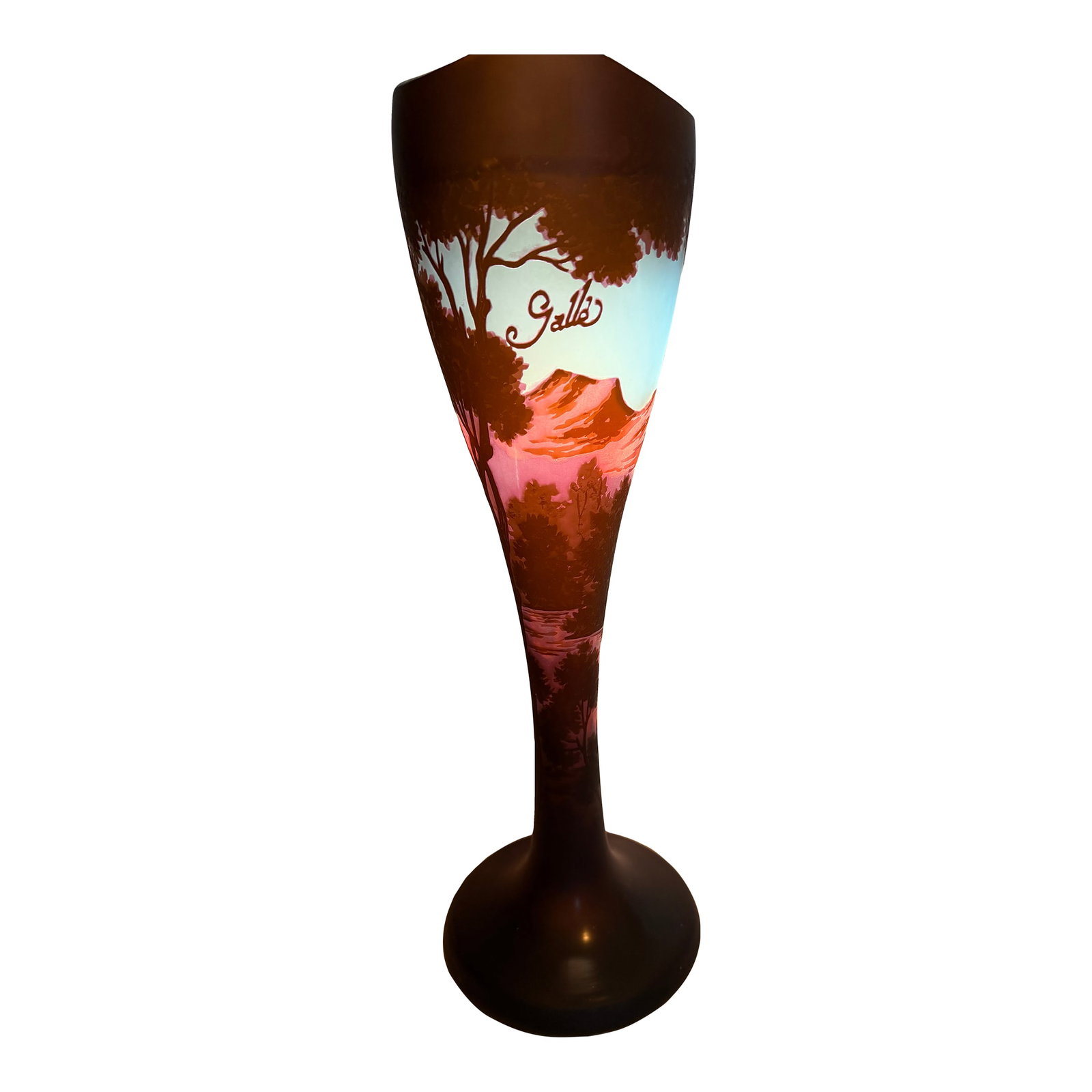Mid 20th Century Signed Galle Art Deco Style Glass Floor Vase With Scenic Landscape Decoration: A striking tall cameo glass vase in the style of Emile Galle, featuring a richly detailed mountain and forest landscape scene rendered in layered tones of burgundy, rose, and blue against a dark groun