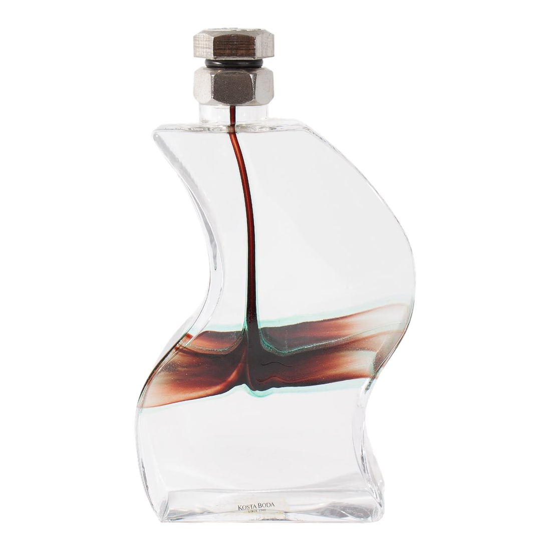 Glass "Macho" Decanter by Kjell Engman for Kosta Boda: A glass decanter by Kjell Engman for Kosta Boda, titled "Macho." This piece curves to the side, as if stretching and features a rusty brown stripe that drips down from the cap and wraps around the mid