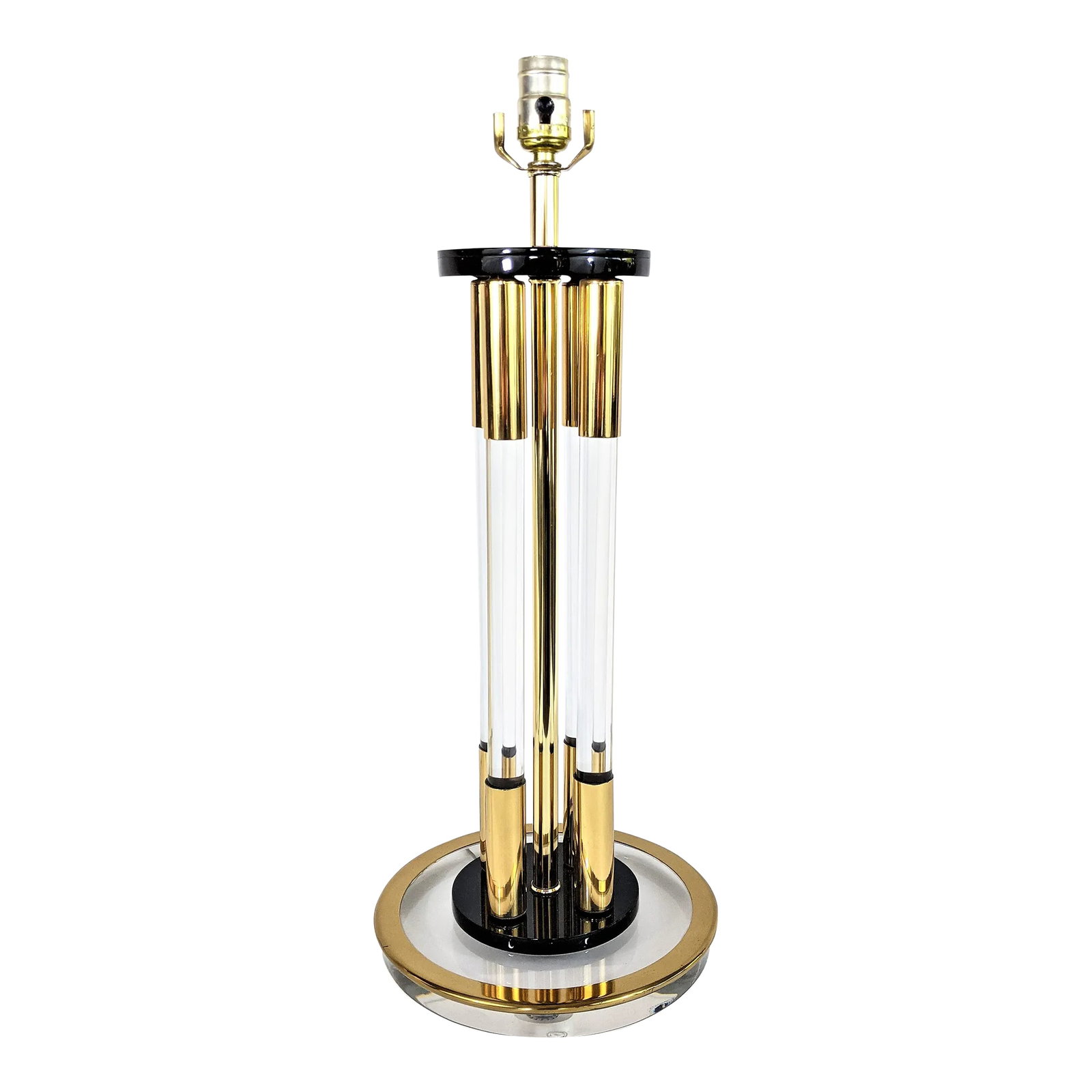 Clearlite by Bauer Lucite and Brass 4 Column Table Lamp Vintage: Vintage Mid-century Clearlite by Bauer lamp with four acrylic or lucite columns wrapped in brass accents. The tubular posts sit on top of a black acylic plate on top of a clear lucite round base with 